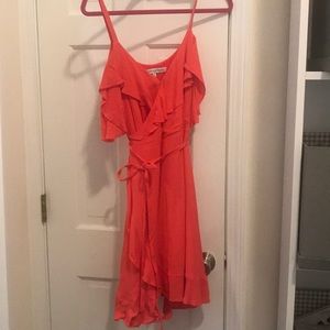 Pink wrap dress with ruffle details